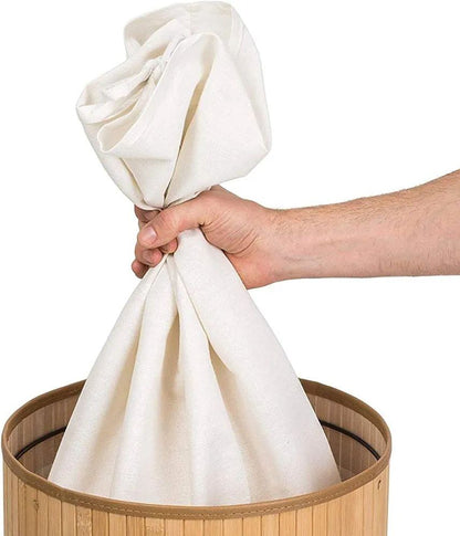 باسكت غسيل بامبو مبطن بكتان | Round Seagrass Laundry Basket – Bamboo & Linen Lined